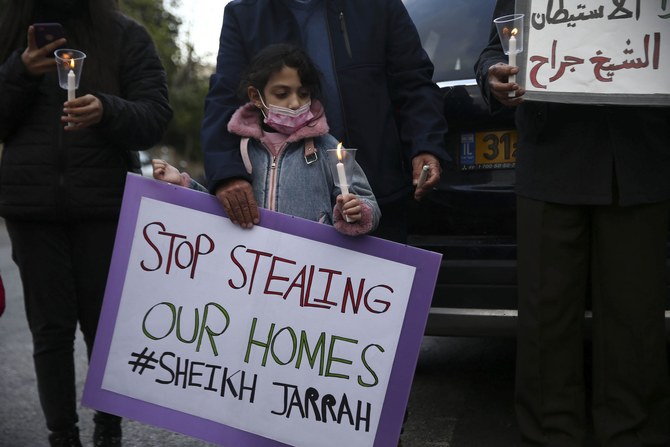 Palestinian families from Sheikh Jarrah during a demonstration to mark the 45th anniversary of Land Day, March 30, 2021. (Getty Images)