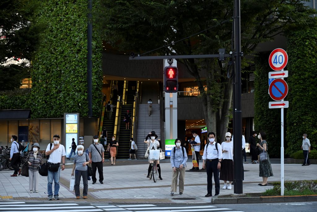 Japan expands its coronavirus state of emergency to eight more prefectures. (AFP)