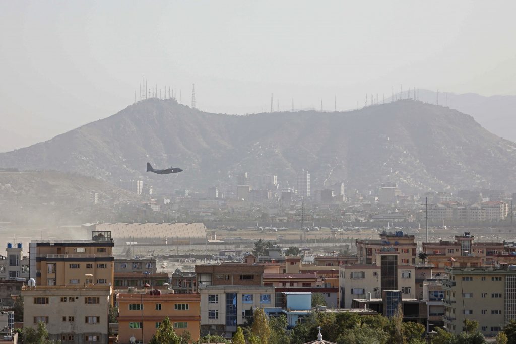 A military aircraft takes off from the military airport in Kabul on August 27, 2021, as the Pentagon said the evacuation of tens of thousands of people from Afghanistan still faces more possible attacks like the bombing that killed scores of people outside the Kabul airport. (AFP)