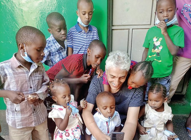 The 56-year-old philanthropist has a small office in Uganda and currently looks after almost 10,600 children and 7,400 families as well as 20 orphanages, five schools, a hospital and a clinic across several countries on the continent. (Photos/Supplied)