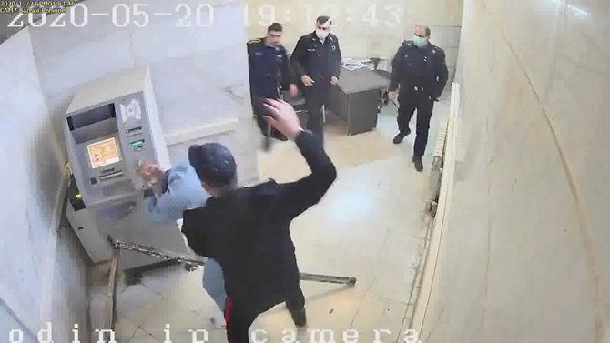 A frame grab taken from video shows a guard beating a prisoner at Evin prison in Tehran, Iran. (The Justice of Ali via AP)