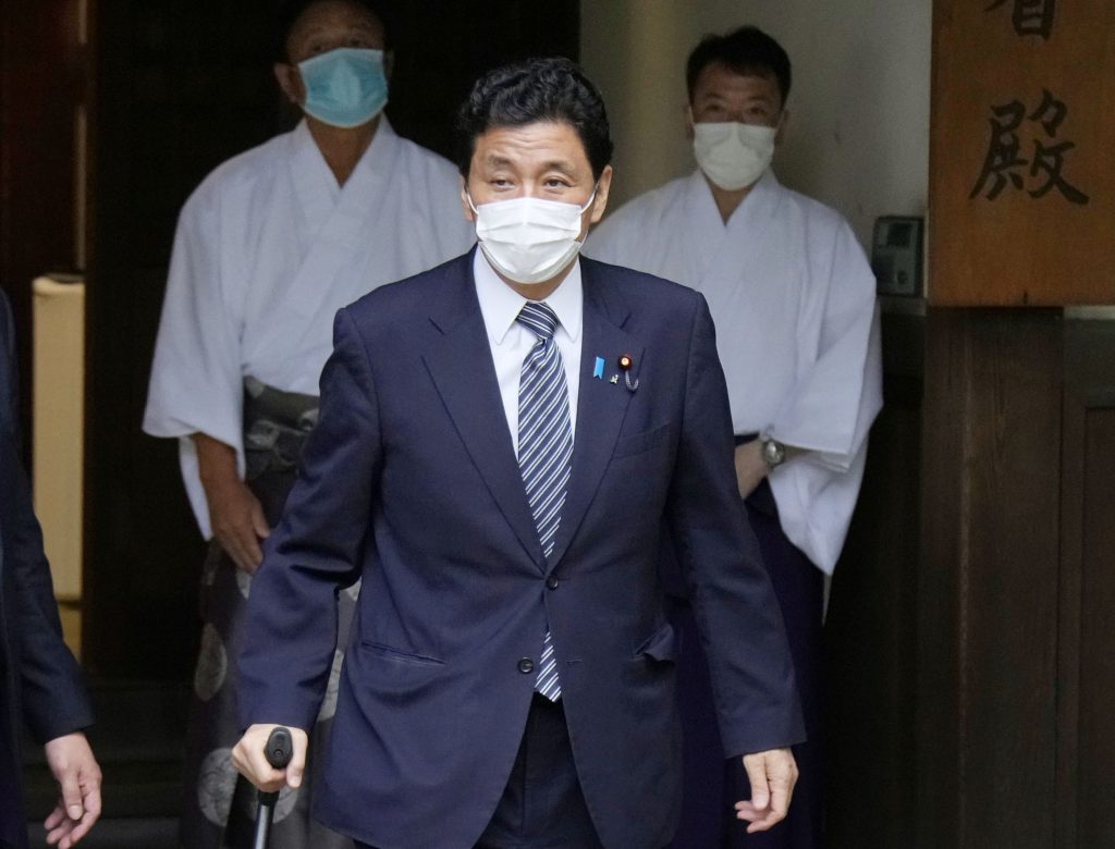 Japan's Defense Minister Nobuo Kishi visits the Yasukuni Shrine in Tokyo, Japan, Aug. 13, 2021. (File photo/Kyodo via Reuters)