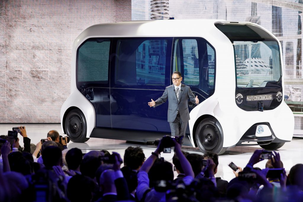 Toyota Motor Corporation President Akio Toyoda, shows the e-Palette autonomous concept vehicle at the Tokyo Motor Show, in Tokyo, Japan October 23, 2019. (Reuters)