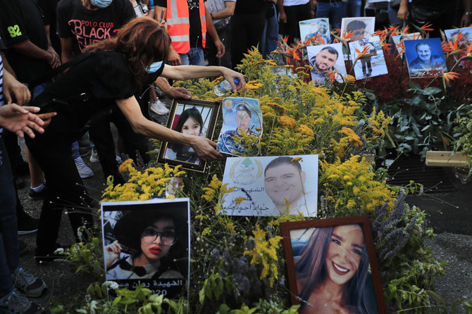 A relative of a victim who was died in the last August 2020 devastating Beirut Port explosion protests for justice. (AP)