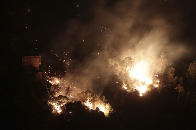 A forest burns near the village of Larbaa Nath Irathen, neat Tizi Ouzou, 100 kilometers east of Algiers, Wednesday, Aug.11, 2021. (AP)