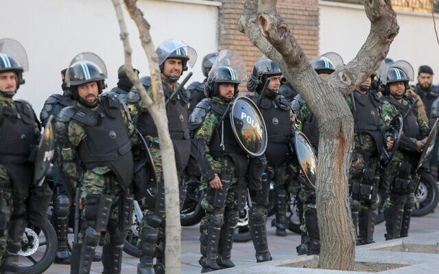 Iranian security forces standing guard in Tehran. Amnesty International has said security personnel used “unlawful force.” (AFP/File Photo)