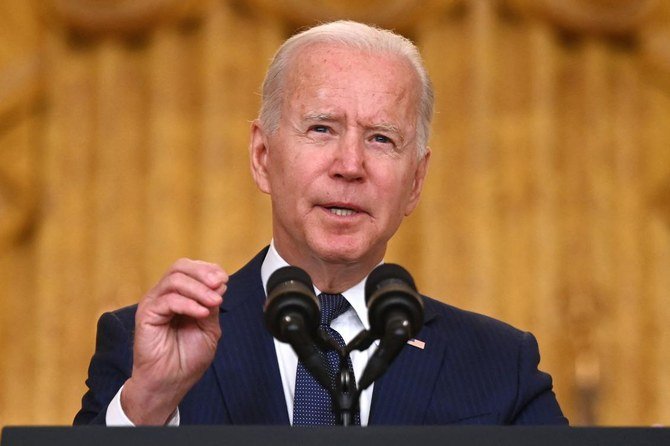 US President Joe Biden delivers remarks on the terror attack at Hamid Karzai International Airport, and the US service members and Afghan victims killed and wounded, in the East Room of the White House, Washington, DC on August 26, 2021. (AFP)