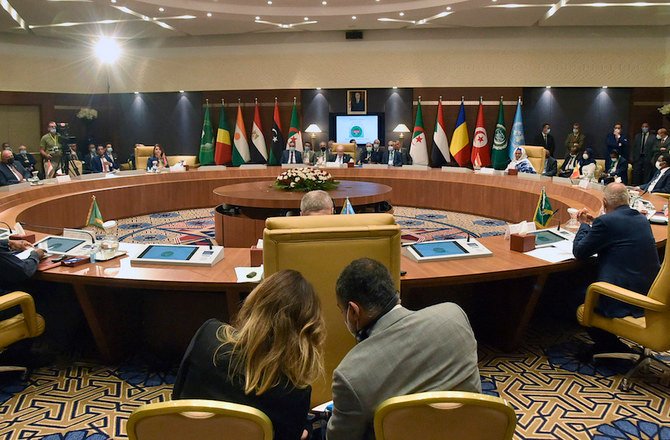 Officials attend a meeting by Libya’s neighbors as part of international efforts to reach a political settlement to the country’s conflict, in the Algerian capital Algiers, on Aug. 30, 2021. (AFP)