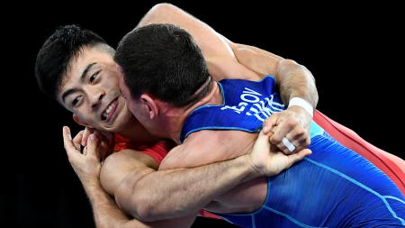 Kenichiro Fumita of Japan in action against Lenur Temirov of Ukraine. (Reuters)