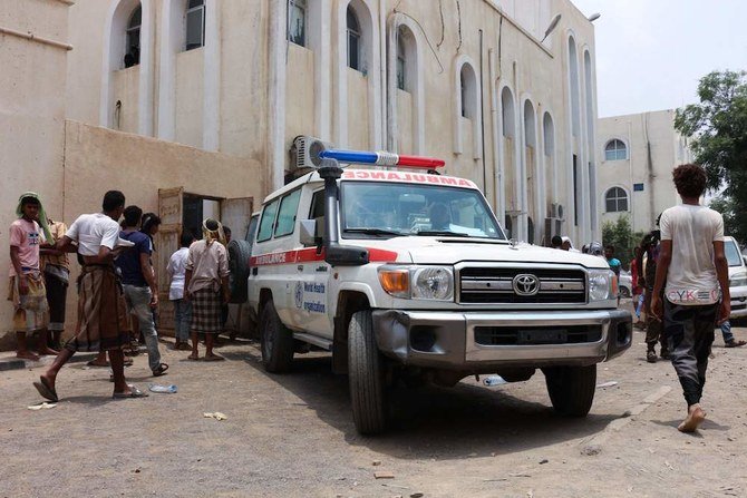 An ambulance transports casualties of strikes on Al-Anad air base to the Ibn Khaldun hospital in the government-held southern province of Lahij, on Aug. 29, 2021. (AFP)