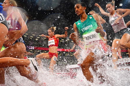 Runners in the 3,000-meter steeplechase said the water splashing from the water jump was hot. (Reuters)