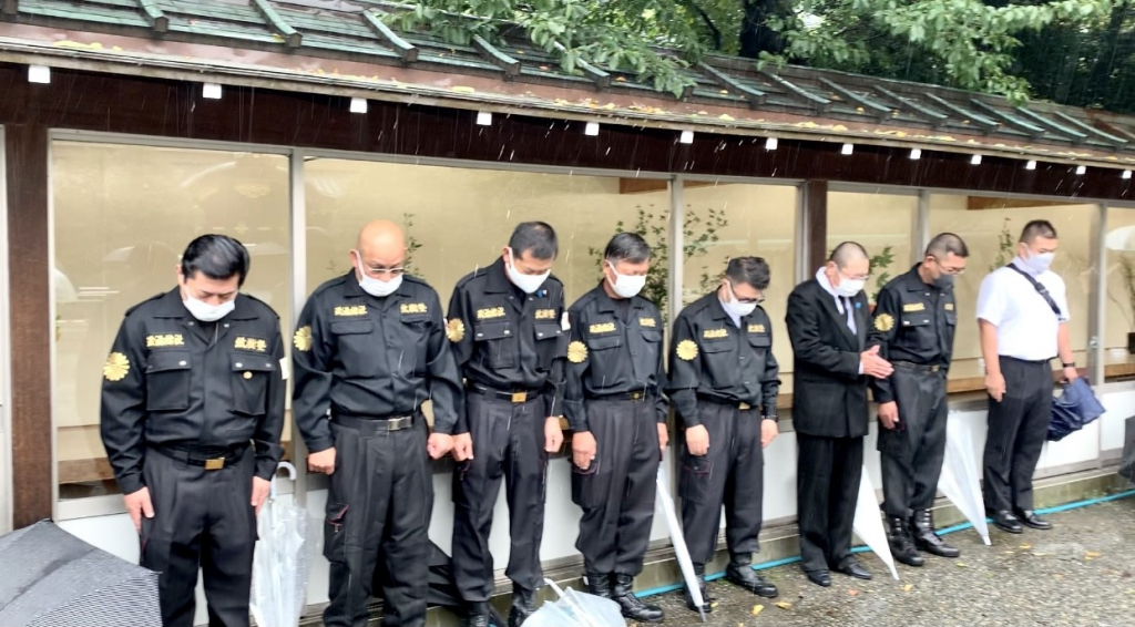 Some Japanese nationalists dressed in Imperial Army uniforms sported masks with Japan's Rising and Radiant Sun flag, an ancient symbol of the Imperial Army. (ANJP)