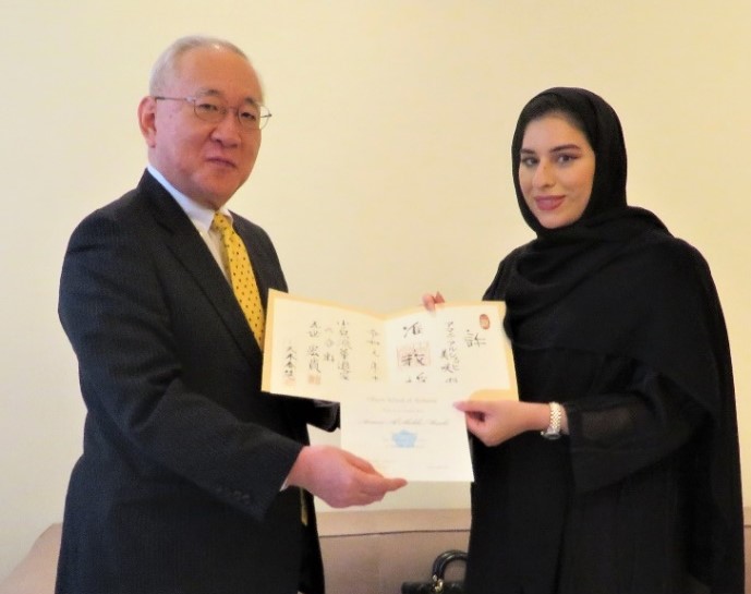 Ambassador of Japan, Akihiko Nakajima and Alshehhi with the official certificate from Ohara School of Ikebana. (Supplied)