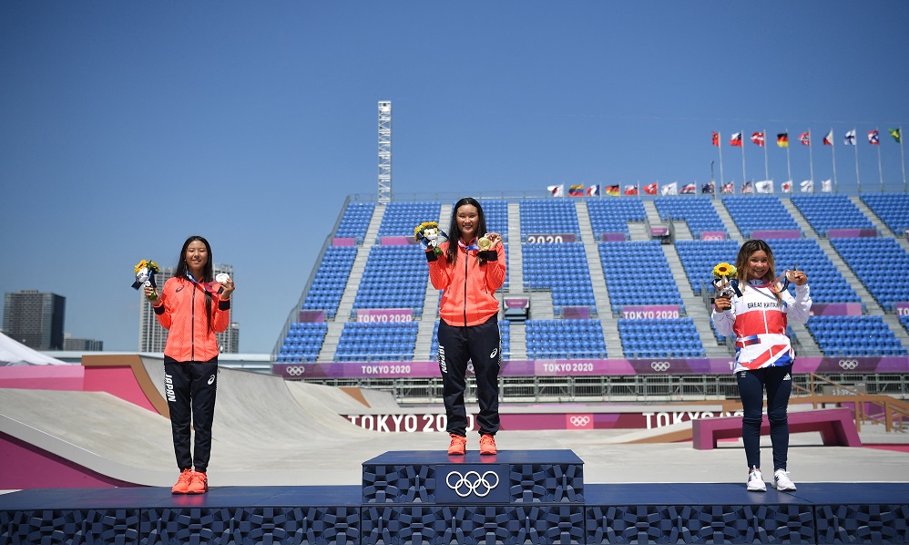 (From left) Silver medallist Japan's Kokona Hiraki, gold medallist Japan's Sakura Yosozumi and bronze medallist Britain's Sky Brown pose on the podium of the women's park final during the Tokyo 2020 Olympic Games at Ariake Sports Park Skateboarding in Tokyo on August 04, 2021. (AFP)