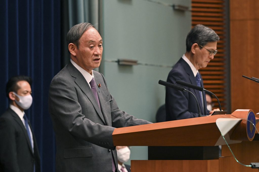 Suga, also president of the LDP, announced his decision not to run in the party's leadership election for effectively choosing the country's prime minister. (AFP)