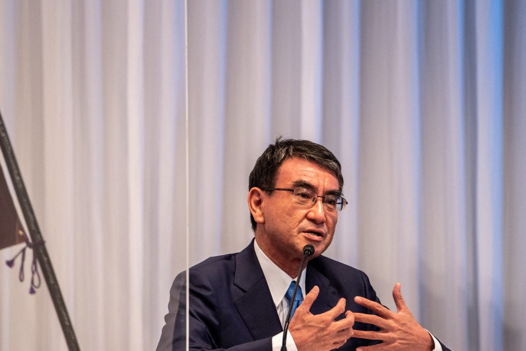 Candidate for the presidential election of the ruling Liberal Democratic Party Taro Kono, the cabinet minister in charge of vaccinations, speaks a debate organized by Liberal Democratic Party, Youth Bureau, Women's Bureau at Liberal Democratic Party headquarters in Tokyo on September 20, 2021. (AFP)