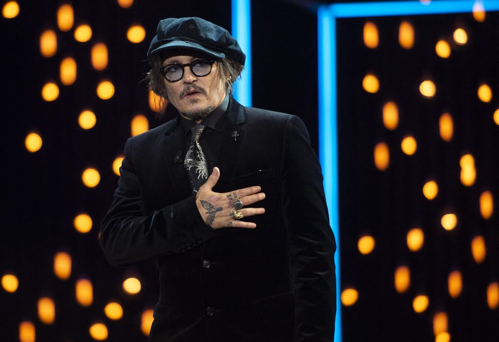 US actor Johnny Depp receives the Donostia Award for his career, in the 69th San Sebastian Film Festival in the northern Spanish Basque city of San Sebastian on September 22, 2021. (AFP)