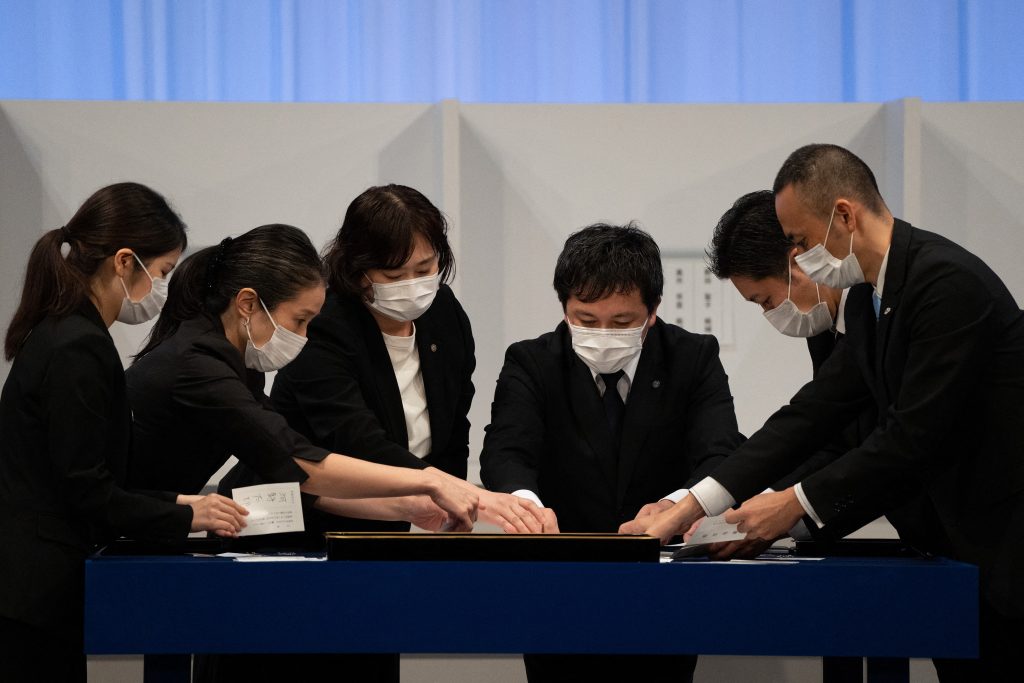 Votes are counted during the Liberal Democrat Party leadership election in Tokyo on September 29, 2021. (AFP)
