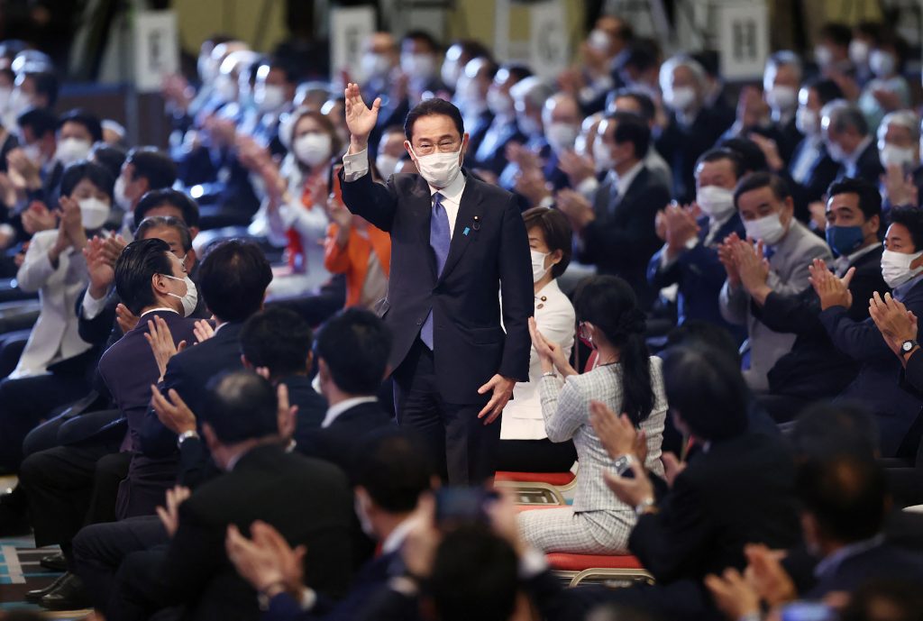 Candidate for the presidential election of the ruling Liberal Democratic Party (LDP) Fumio Kishida (C), former foreign minister, reacts after being elected as the new president at the LDP presidential election in Tokyo on September 29, 2021. (AFP)