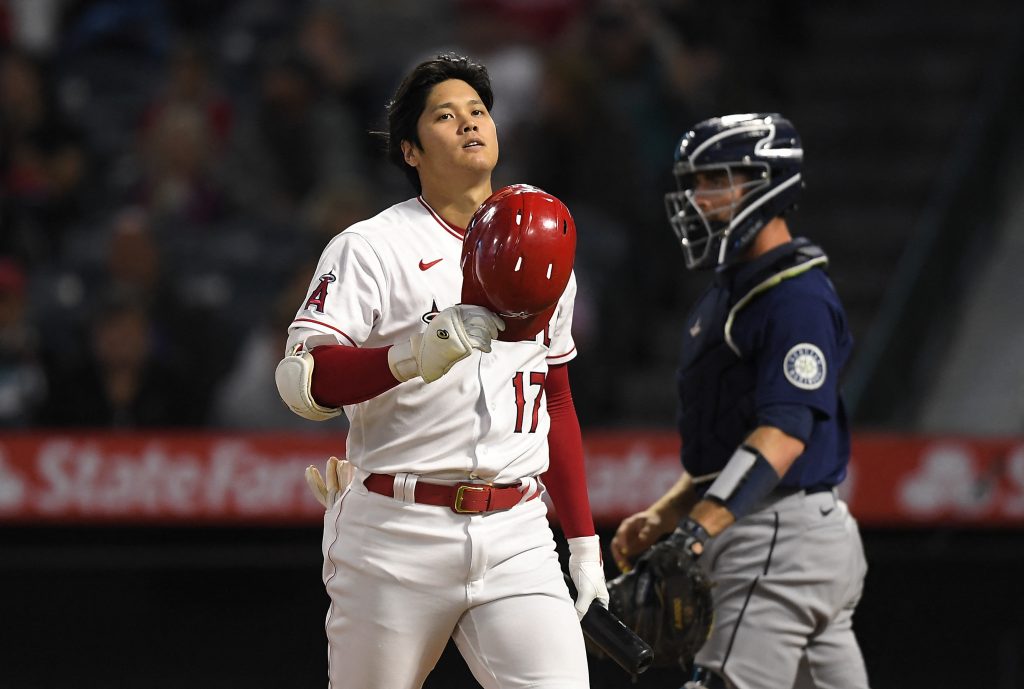Shohei Ohtani #17 of the Los Angeles Angels strikes out against starting pitcher Logan Gilbert #36 of the Seattle Mariners at Angel Stadium of Anaheim on September 24, 2021 in Anaheim, California. (Kevork Djansezian/Getty Images/AFP)