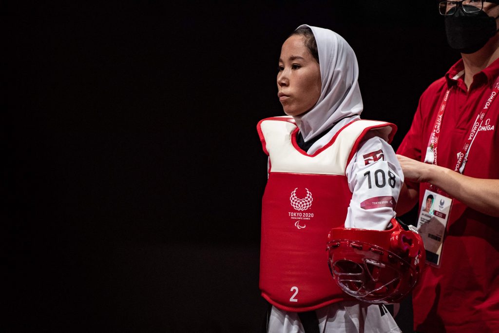 Afghanistan's Zakia Khudadadi prepares to compete with Uzbekistan's Ziyodakhon Isakova in their women's taekwondo K44 bout during the Tokyo 2020 Paralympic Games at Makuhari Messe Hall in Chiba, Sep. 2, 2021. (File photo/AFP)