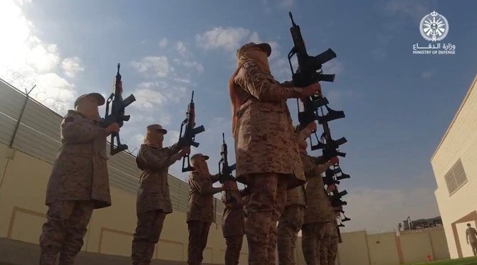 The first batch of Saudi women soldiers present arms during their parade. (Screengrab from Ministry of Defense video)