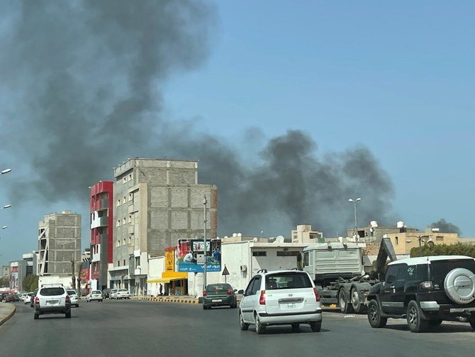 Smoke rises after an attack on Administrative Control Authority in Tripoli, Libya on Tuesday. (Reuters)