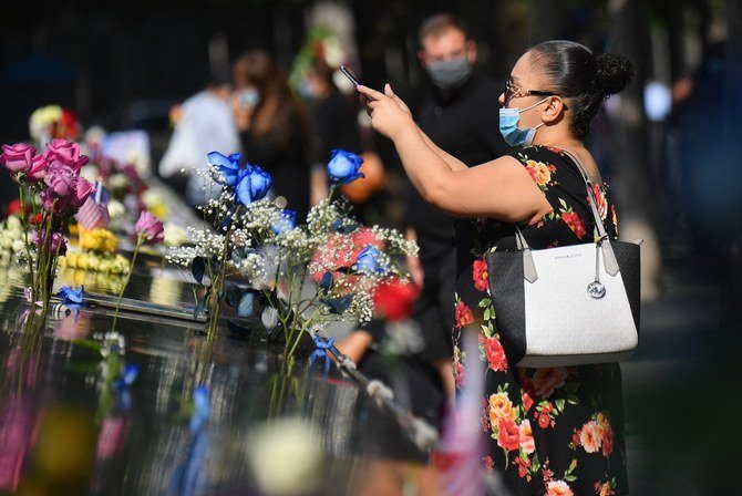 Mourners gather at the 9/11 Memorial & Museum in New York on September 11, 2020, as the US commemorates the 19th anniversary of the 9/11 attacks. (File/AFP)