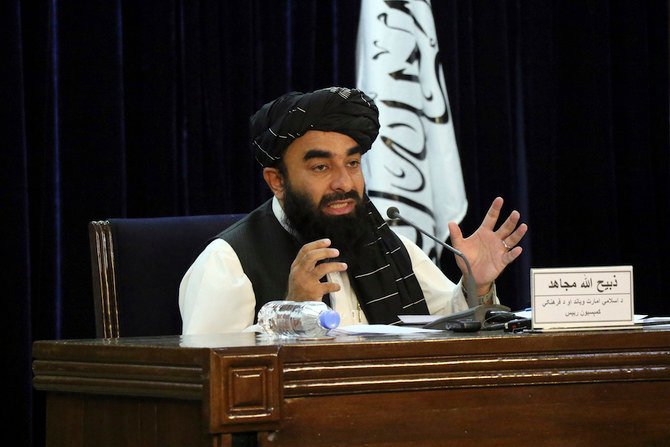 Taliban spokesman Zabihullah Mujahid speaks during a press conference in Kabul announcing the Taliban's caretaker Cabinet. (AP)