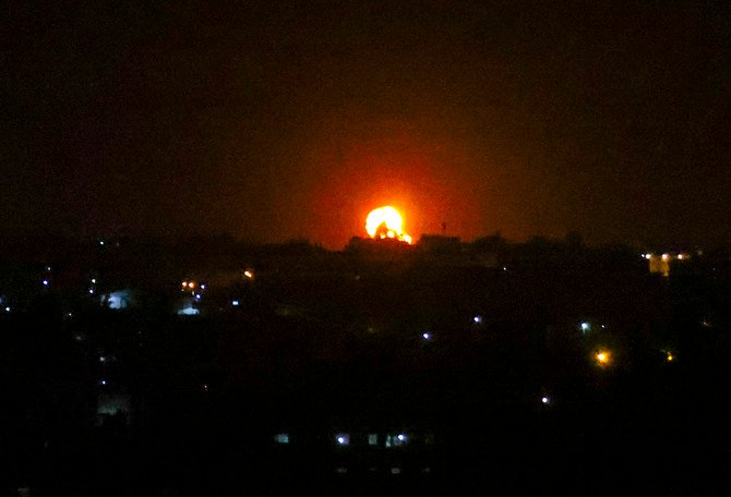 A fireball rises following an air strike in Khan Yunis in the southern Gaza Strip, in the early hours of Sept. 11, 2021. (AFP)