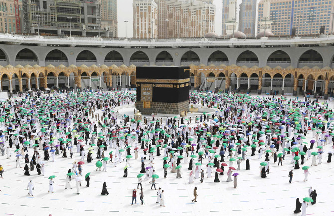 Muslim pilgrims, keeping social distance and wearing face masks, perform Tawaf during the annual Hajj pilgrimage, in the holy city of Makkah, Saudi Arabia July 20, 2021. (REUTERS)