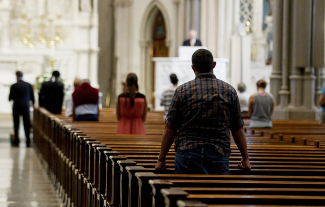 Parishioners worship during a mass to celebrate the Assumption of the Blessed Virgin Mary at St Paul Cathedral, the mother church of the Pittsburgh Diocese in Pittsburgh, Pennsylvania. (AFP file photo)