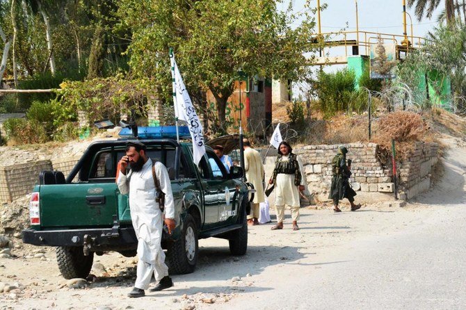 Taliban members inspect near the site of a blast in Jalalabad on September 18,2021. (AFP)