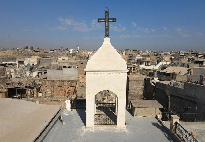 The church bell tower of the Syriac Christian church of Mar Tuma. (AFP)