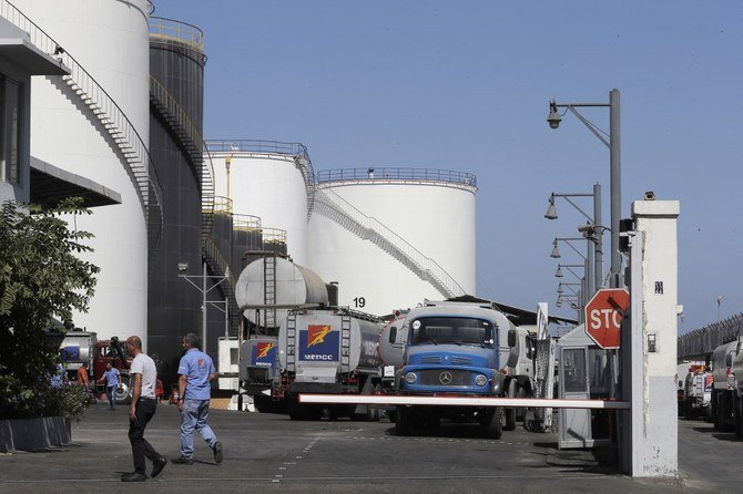 A Syrian refugee in Minieh, north Lebanon, died on Saturday after accidentally swallowing a large quantity of gasoline while siphoning it from his car in a black market fuel operation. (File/AFP)