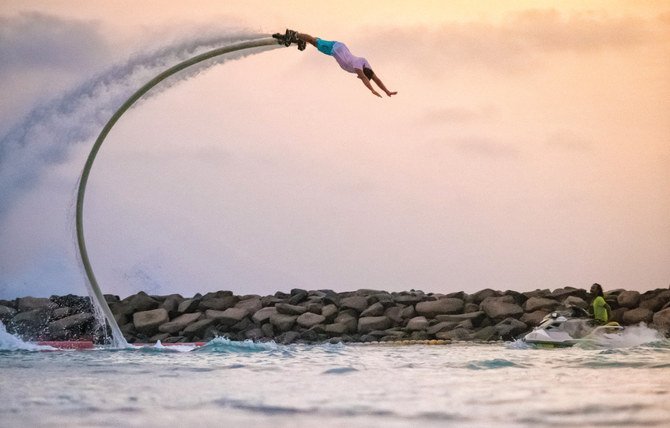 With the right balance and push, the board allows users to climb out of the water and fly, and one Saudi flyboard instructor can show you how it is done. (Supplied)
