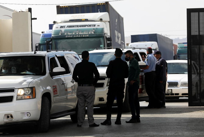 Police officers check cars at Jaber border crossing with Syria, near Mafraq, Jordan, September 29, 2021.(Reuters)