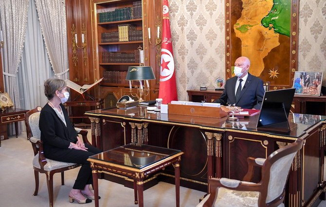 Tunisia’s President Kais Saied meets with newly appointed Prime Minister Najla Bouden Romdhane in Tunis on Sept. 29, 2021. (Tunisian Presidency via Reuters)