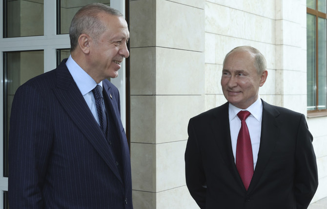 Russian President Vladimir Putin, right, and Turkish President Recep Tayyip Erdogan speak before Erdogan leaves after their talks at the Bocharov Ruchei residence in the Black Sea resort of Sochi, Russia, Sept. 29, 2021. (AP)