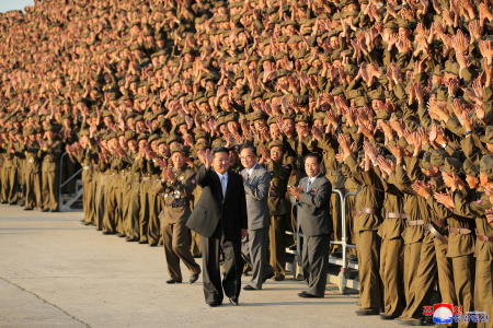 North Korean leader Kim Jong Un greets military members on the 73rd anniversary of the country's founding, in Pyongyang, in this undated image supplied by North Korea's Korean Central News Agency on September 9, 2021. (KCNA via Reuters)