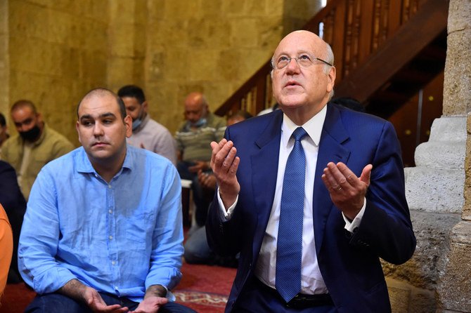 Lebanon’s Prime Minister-designate Najib Mikati attends Friday prayers before meeting with Lebanon’s President Michel Aoun, at a mosque in Beirut, Lebanon, September 10, 2021. (Reuters)
