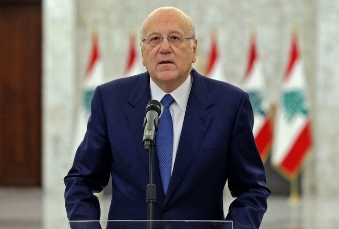 Prime Minister-designate Najib Mikati announcing the formation of a new Lebanese government after a meeting with the President at the presidential palace in Baabda. (AFP)