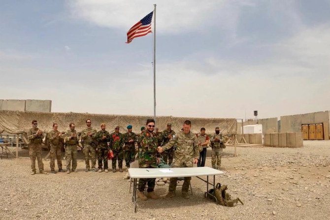 US military officials hand over a camp to Afghan Defense Forces in Helmand province, Afghanistan. (Ministry of Defense Press Office/Handout via Reuters)