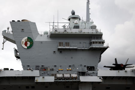 The British Royal Navy's HMS Queen Elizabeth aircraft carrier sits anchored at the US naval base in Yokosuka, Kanagawa Prefecture, Japan, Monday, Sept. 6, 2021. (AP)