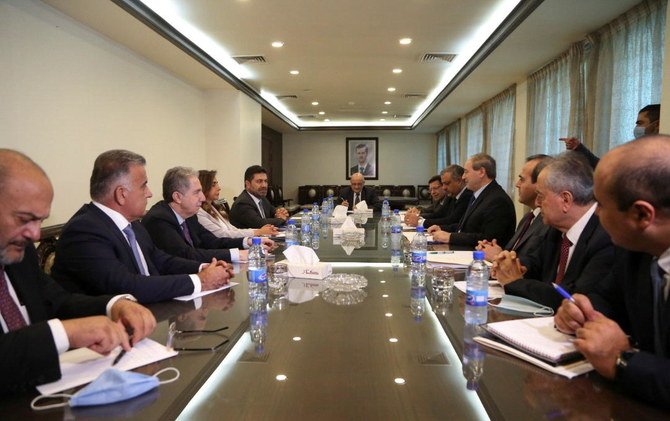 Syrian FM Faisal Al-Mekdad meets with a delegation from Lebanon's caretaker government in Damascus, Syria September 4, 2021. (Reuters)