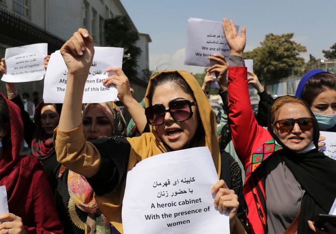 Women gather to demand their rights under the Taliban rule during a protest in Kabul, Afghanistan, on Sept. 3, 2021. (AP Photo/Wali Sabawoon)