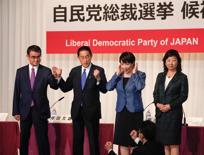 Leaders of Japan's ruling Liberal Democratic Party (LDP) gather for a press conference in Tokyo on Sept. 17, 2021, ahead of their election to choose a successor for outgoing party president and prime minister Yoshihide Suga. (POOL / AFP)