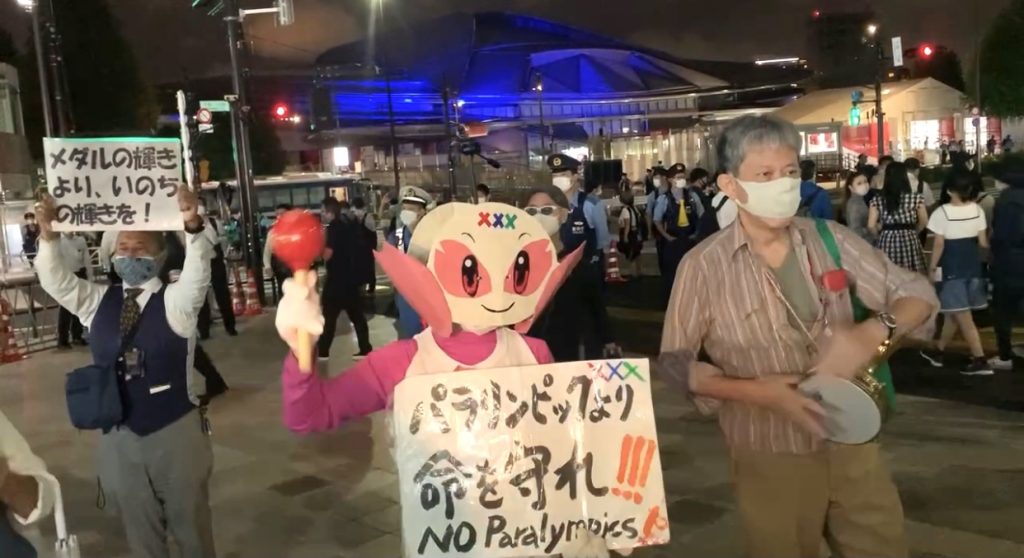 Demonstrators protesting against the Olympics and Paralympics near the national stadium in Tokyo, Japan. (ANJP Photo)