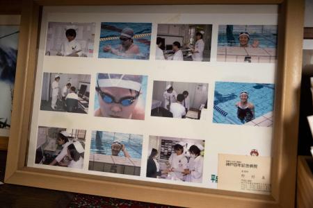 In this photo taken on August 28, 2021, photographs of Japanese violinist Manami Ito are seen in a picture frame at her residence in Shizuoka. (AFP)