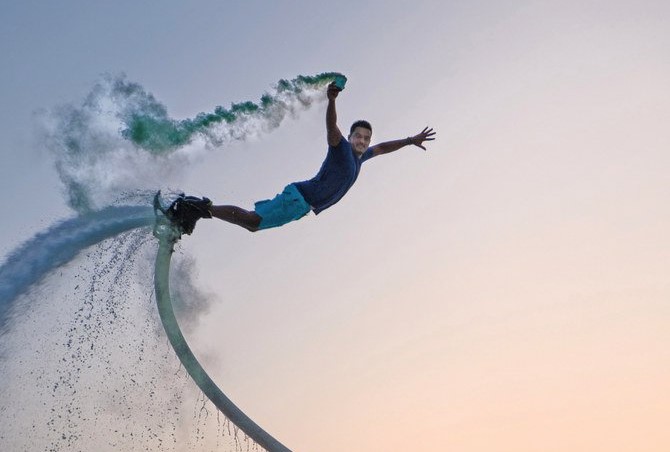 With the right balance and push, the board allows users to climb out of the water and fly, and one Saudi flyboard instructor can show you how it is done. (Supplied)
